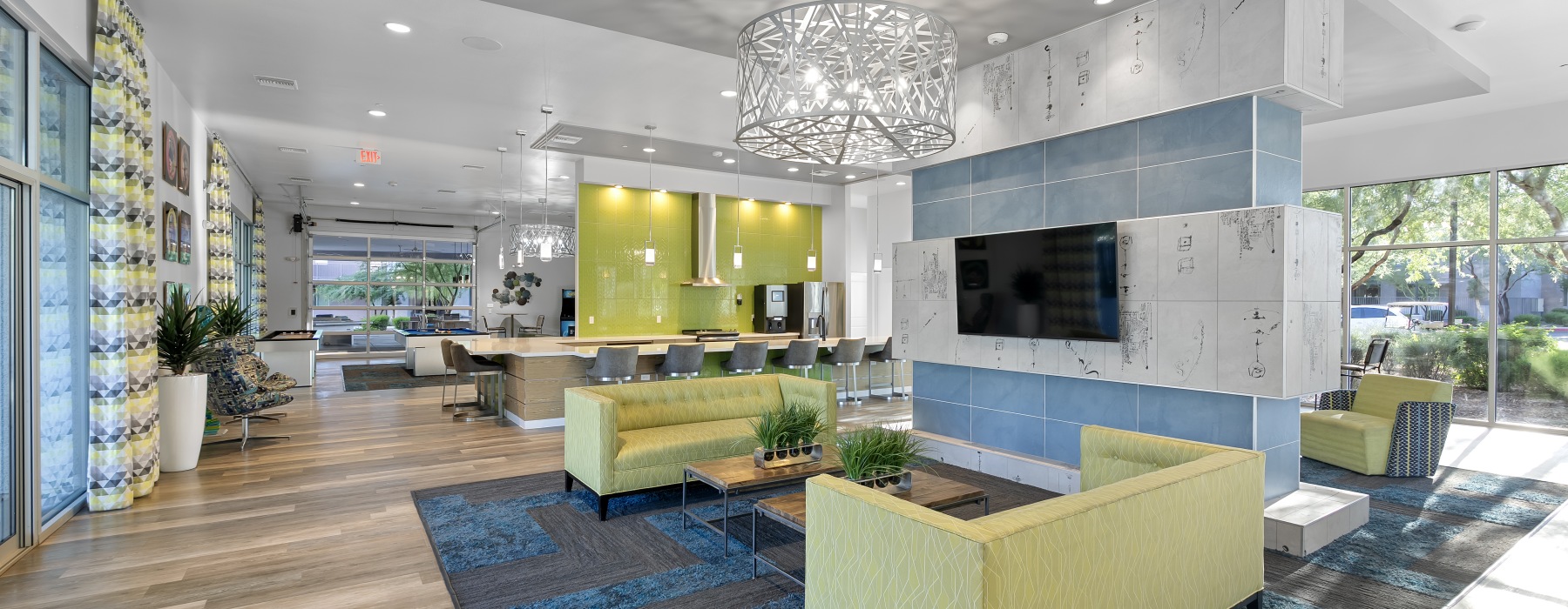 room with blue walls and green couch