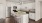 a kitchen with white cabinets